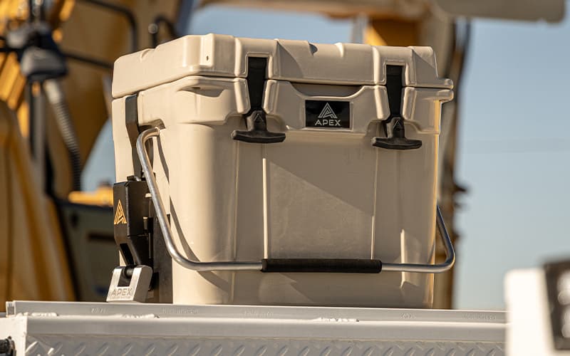 Close up image of an Apex cooler mounted onto a work truck in a construction site