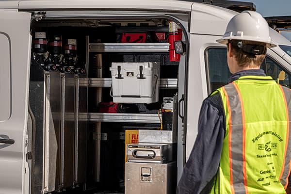 White Apex A20 cooler mounted inside of a service truck