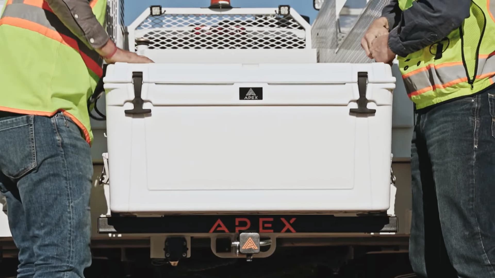 Apex Cooler being loaded onto work truck and job site